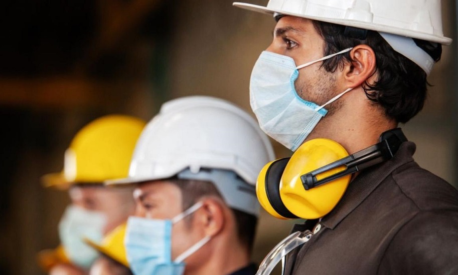 Construction workers wearing masks